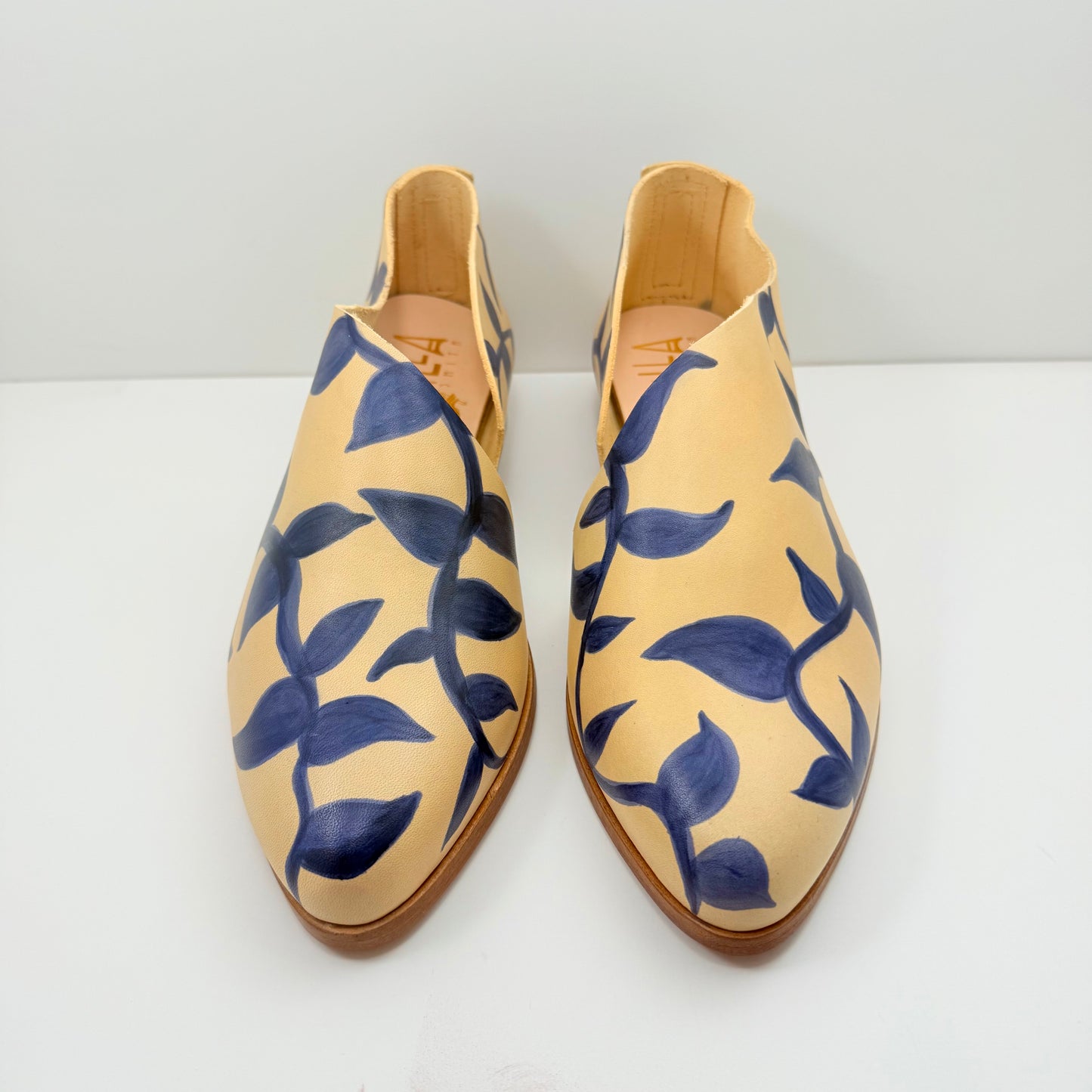 The Kim in Butter with Vines Pattern in Azure